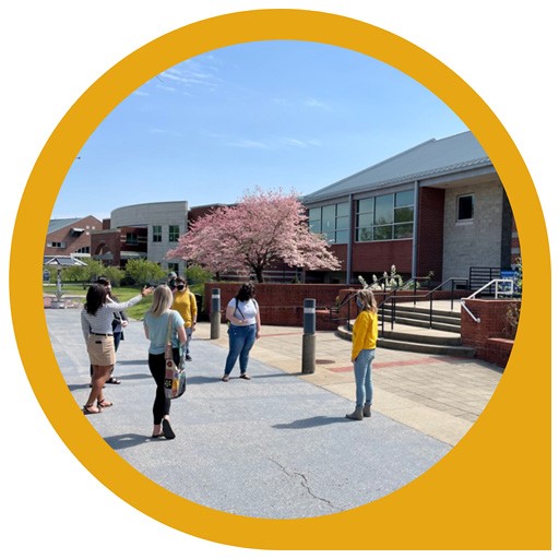 OCTC staff taking a group of students on a campus tour