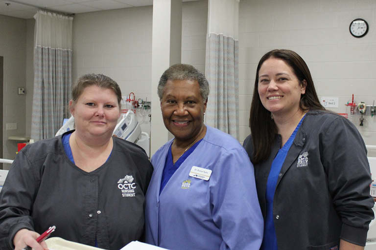 nursing students with faculty 