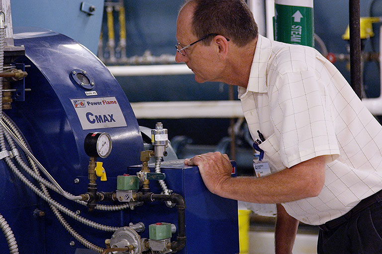 Guy Checking on Machine